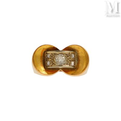 une image d'une bague en or et diamants sur fond blanc