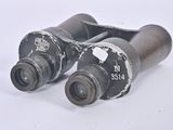 pair of old binoculars on white background with white background