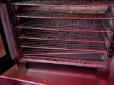 a large oven that has a lot of food inside of it