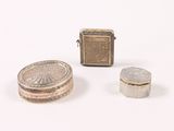 three different types of silver and gold jewelry on a white surface