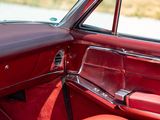 a close up of a car ' s interior with the door open