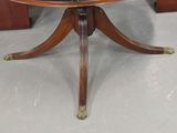 an image of a table with a clock on it