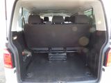 the back of a van with the back seats down and the back of the van with the back seats down
