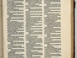 an open book with a page of text in it on a table