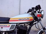 a motorcycle that is parked on the side of the street