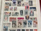 un livre avec beaucoup de timbres