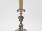 an antique silver plated table lamp on a white background