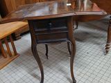 many chairs and tables in a room with a lot of wood furniture
