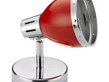 an image of a red lamp sitting on top of a metal base
