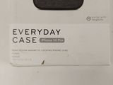 a box with a phone inside of it on a table