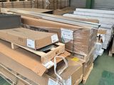 many boxes stacked on top of each other in a warehouse