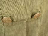 a close up of a pair of pants with buttons on them