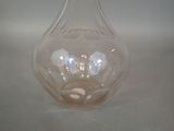 a clear glass vase with a light inside of it
