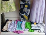 a picture of a display of clothing on a shelf