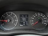 a close up of a car dashboard with a speedometer and gauges