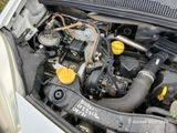 a picture of a car engine with its hood open