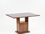 a wooden table with a square top on a white background