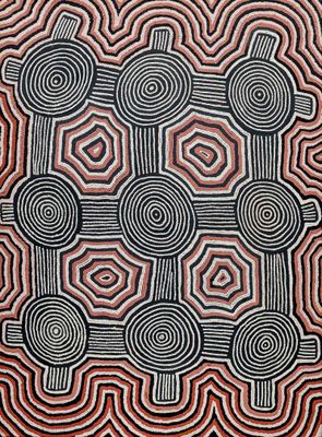 a close up of a black and red artwork with circles