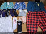 a box of clothing and a pair of gloves on a table