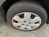 a close up of a tire on a car ' s rim