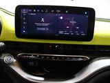 the dashboard of a car with a digital display in the center