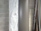 a large metal tank sitting in the middle of a room