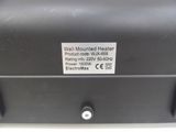 the back of a black box with a sticker that says wall mounted heater