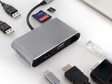 a laptop and a usb drive next to each other on a table