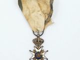 l'image d'une médaille portant une étoile