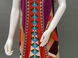 an image of a mannequin wearing a multi colored dress