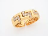 an 18k yellow gold and diamond ring