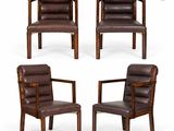 a set of four brown leather chairs on a white background