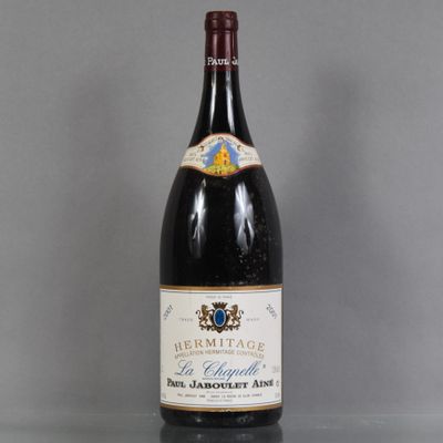 a bottle of wine that is sitting on a table