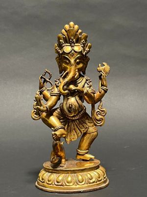 an image of a statue of an elephant with a bird on its back