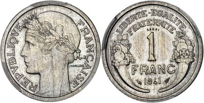 a close up of a coin with a woman ' s head on it