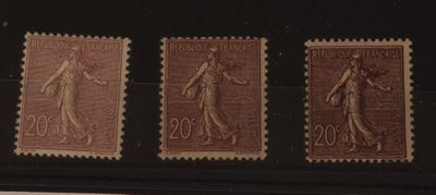 trois timbres représentant une femme et un homme