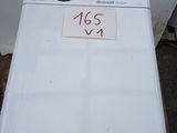 an image of a washing machine with a price tag on it