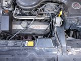 a picture of a car engine with its hood open
