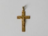 crucifix plaqué or sur fond blanc