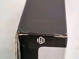 a black box with a white logo on the side of it