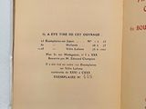 an open book with a picture of a cat on it
