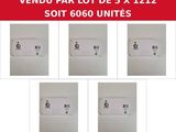 six different views of a white box with a red and green label