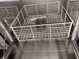 a dishwasher with a dirty dish inside of it