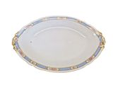 an image of a white plate with blue and pink trim
