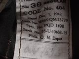 a label on the back of a jacket that says uniform service officer