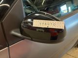 a sticker on the side mirror of a car that says vautio