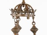 an image of a metal chandelier hanging from a ceiling