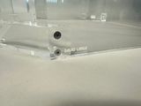 a clear display case with a single piece of glass on it