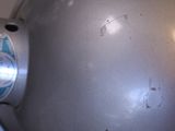 a silver ball with a light on it sitting on a table