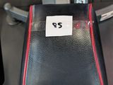 a black and red bag with a price tag on it